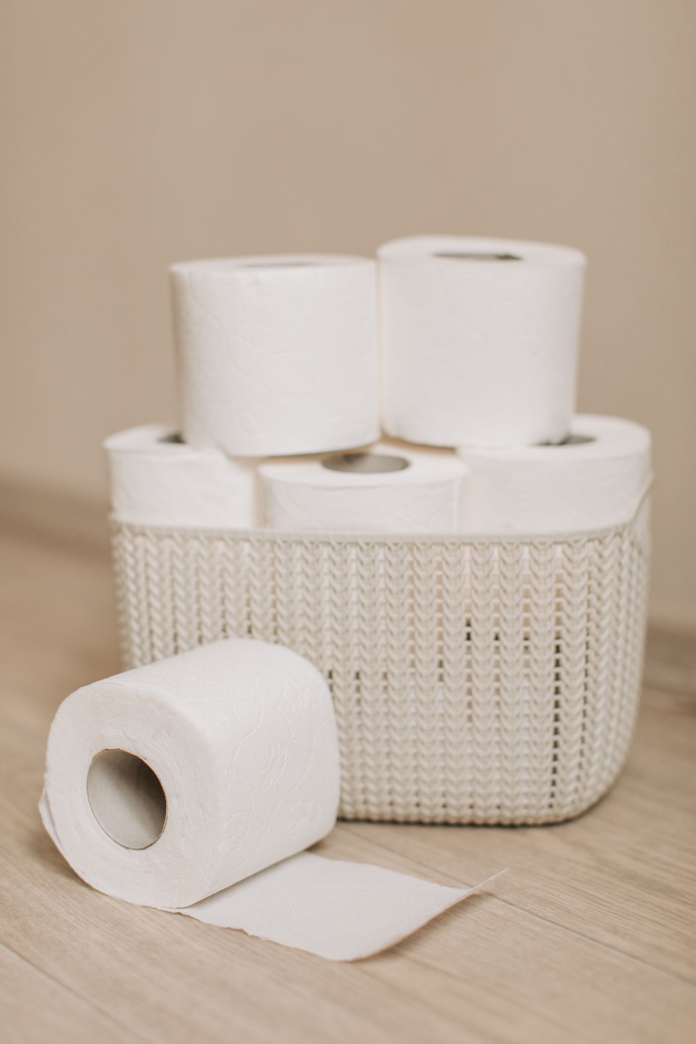 Toilet rolls arranged in a basket
